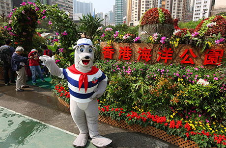 Photo 1: Ocean Park mascot Whiskers in front of the Park’s exhibit